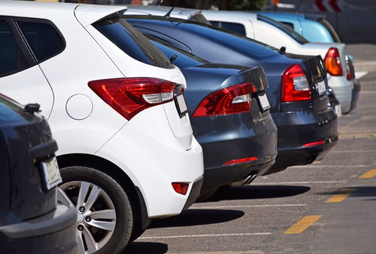student looking for a parking spot at UWF